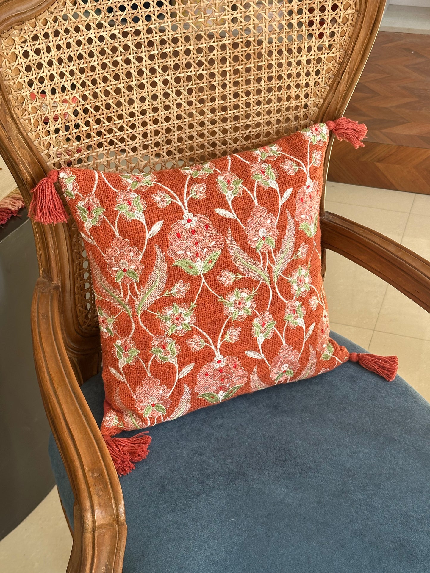 EMBROIDERED RUST CUSHION COVER